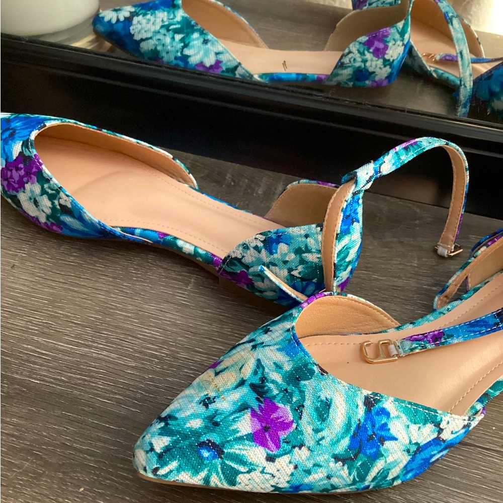 Blue floral flats. Never been worn.:)